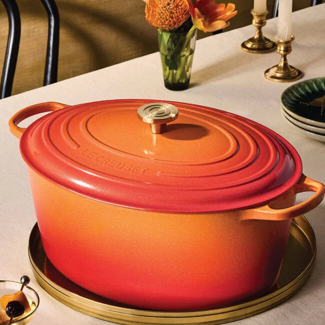 Load image into Gallery viewer, Le Creuset Signature Oval Dutch Oven Flamme Dorée with Crucible Knob
