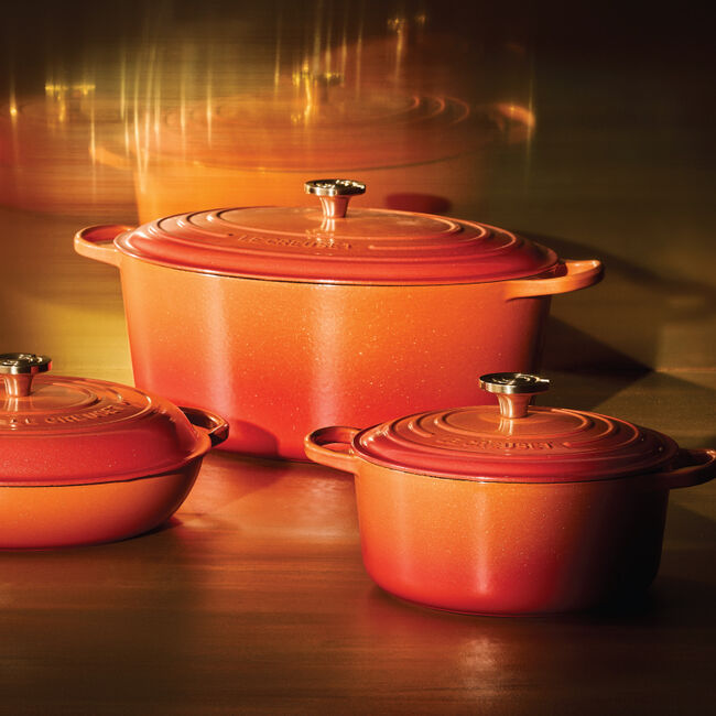 Load image into Gallery viewer, Le Creuset Signature Oval Dutch Oven Flamme Dorée with Crucible Knob
