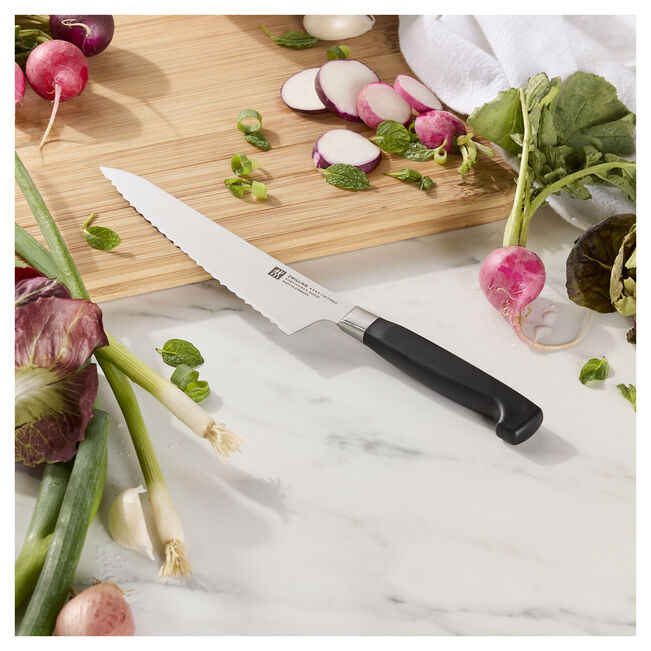 Load image into Gallery viewer, Zwilling Four Star 5.5" Serrated Edge Prep Knife *Sale
