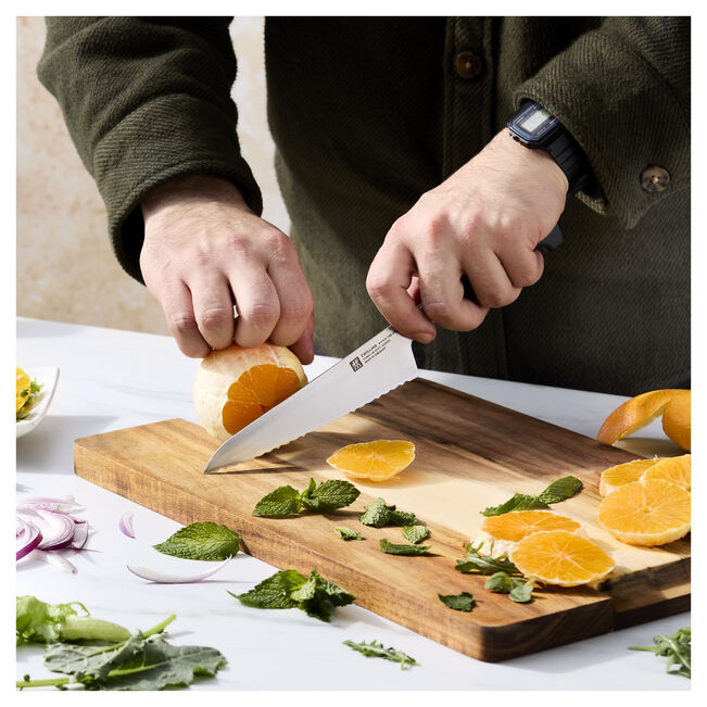 Load image into Gallery viewer, Zwilling Four Star 5.5" Serrated Edge Prep Knife *Sale
