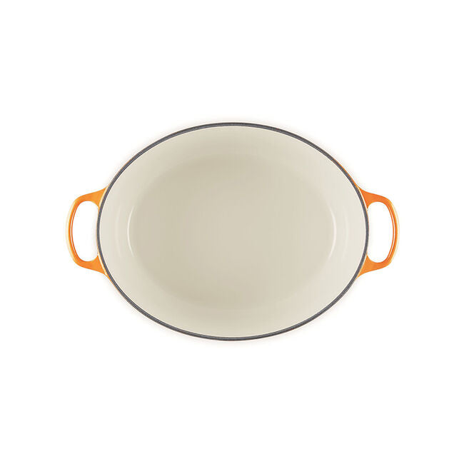 Load image into Gallery viewer, Le Creuset Signature Oval Dutch Oven Flamme Dorée with Crucible Knob
