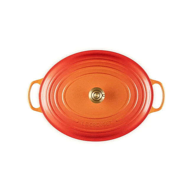 Load image into Gallery viewer, Le Creuset Signature Oval Dutch Oven Flamme Dorée with Crucible Knob
