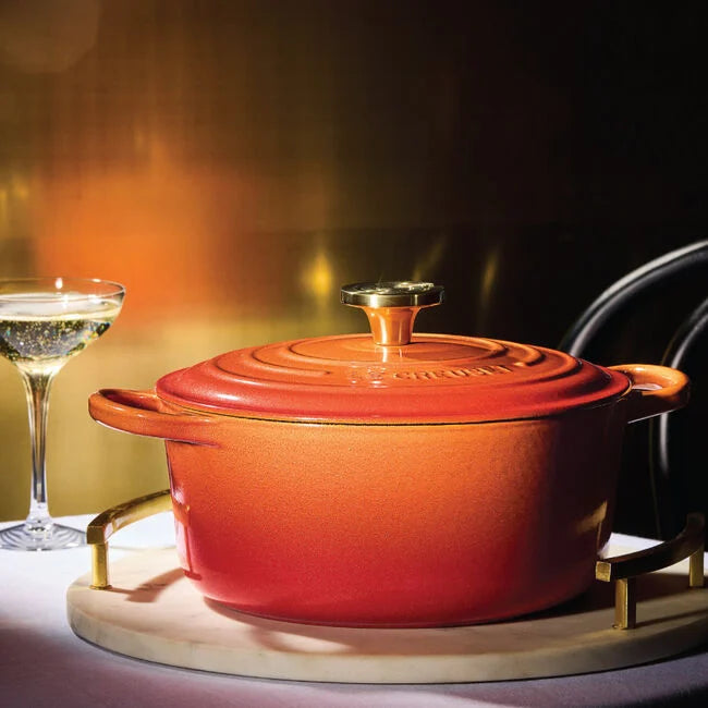 Load image into Gallery viewer, Le Creuset Signature Round Dutch Oven Flamme Dorée with Crucible Knob
