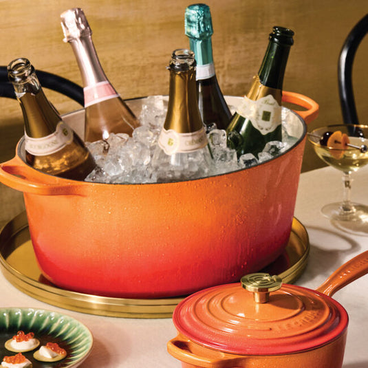 Le Creuset Signature Oval Dutch Oven Flamme Dorée with Crucible Knob