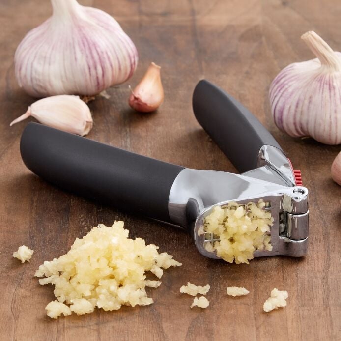 Load image into Gallery viewer, OXO Good Grips Garlic Press with Built-In Cleaner

